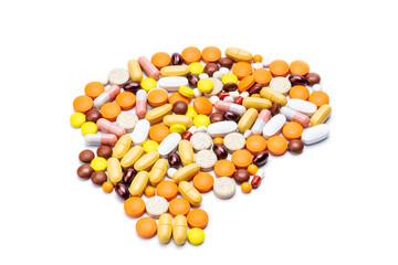 human brain symbol made by drugs, pill and tablets, isolated on white background. mental health medication concept