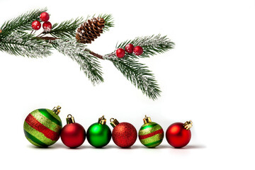 Fototapeta na wymiar A merry Christmas wreath made of fir branches, red and green balls, on a white background. Christmas and New Year.