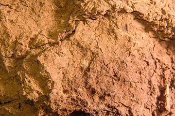 Clay background. Clay texture on the wall. Old clay walls.