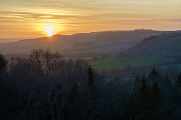 scenic Westerly view with a golden sunset across the Pewsey Vale valley