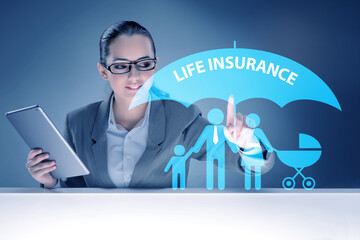Life insurance concept with businesswoman pressing button