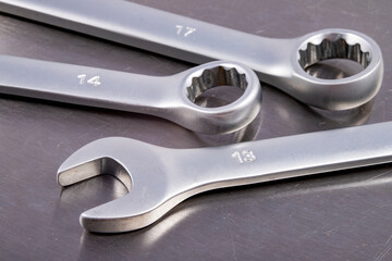 Metal flat workshop wrenches. Accessories for mechanics carrying out repairs in the household.