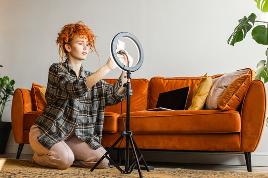 Woman Blogger With Laptop And Ring Light Getting Ready To Shoot Video For Social Media.Blogger Life.