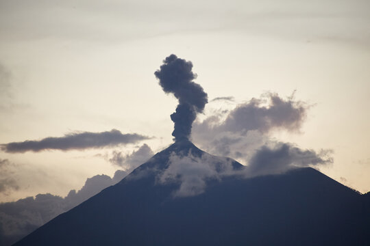 Volcano with smoke near Antigua Guatemala.