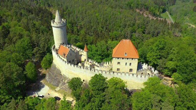Aerial view of medieval castle Kokorin nearby Prague in Czechia. Central Europe. Medieval gothic castle Kokorin, Kokorinsko protected landscape area in Czech Republic. Medieval gothic castle Kokorin.