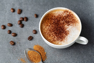 Obraz na płótnie Canvas Appetizing fresh cappuccino in cup