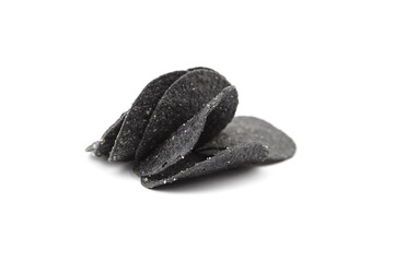 Black potato chips isolated on white background