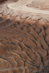 USA, Utah. Designs in the sand from water run-off, Grand Staircase-Escalante National Monument.