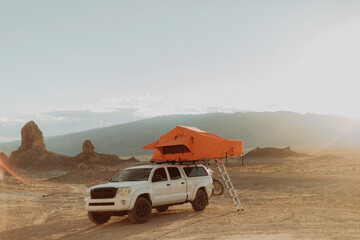 Off road vehicle with tent, Trona Pinnacles, California, US