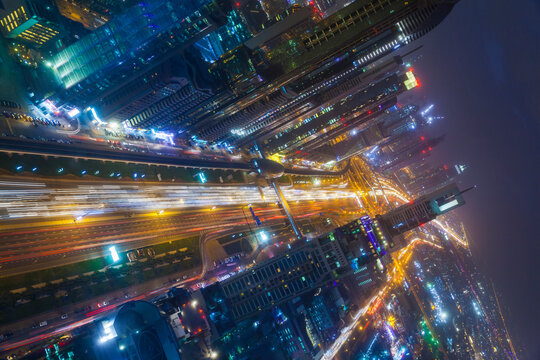 Skyscrapers along Sheikh Zayed Road at evening rush hour, Dubai, UAE