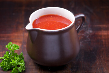 Tomato soup with rice with fresh parsley