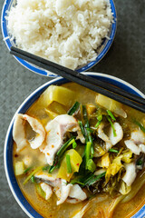 top view fast food of spicy boiled fish with rice vertical composition