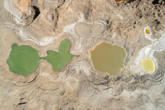 Sink holes on sea shore, Dead Sea, Israel. Aerial photography with drone