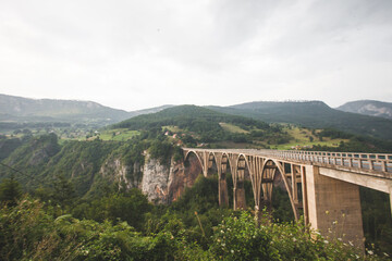 Fototapeta na wymiar landscape with arched bridge
