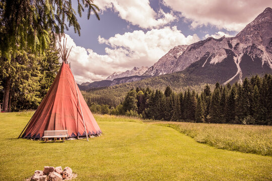 Red teepee in valley landscape, Ehrwald, Tirol, Austria