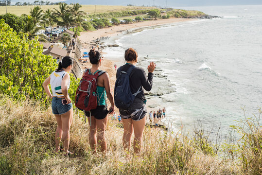 Friends looking down to Hookipa Beach, Maui, Hawaii