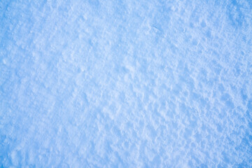 Snow with a loose, uneven texture. fresh snow background