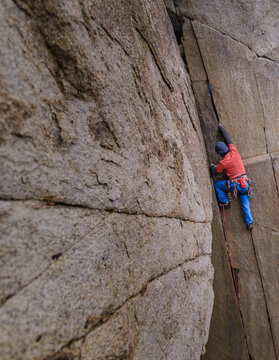 Climber trad climbing, Pine Creek, Bishop, California, USA