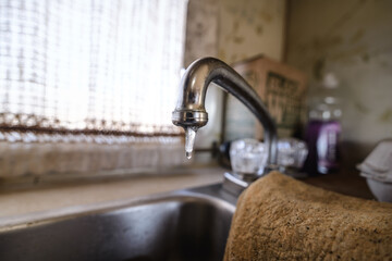 Icicle on tip of tap