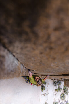 Climber trad climbing, Pine Creek, Bishop, California, USA