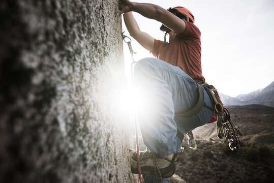 Climber trad climbing, Little Egypt, Bishop, California, USA