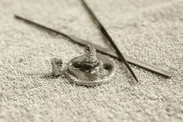 Broken shelf holder in the bathroom. Restoration with composite materials by gluing.