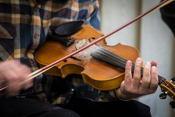 USA, Virginia, Blue Ridge Parkway. Man fiddling at the Blue Ridge Music Center.