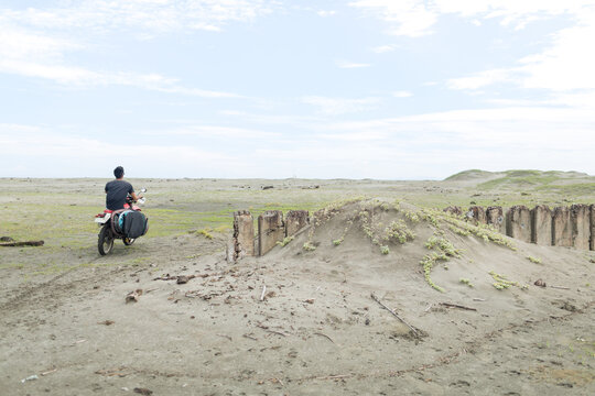 Motorcyclist with surfboard, Abulug, Cagayan, Philippines
