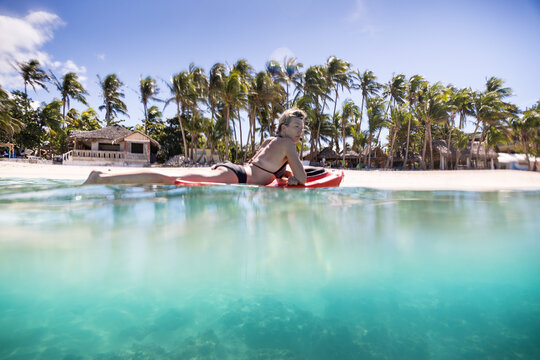 Surfer gliding in sea, Pagudpud, Ilocos Norte, Philippines