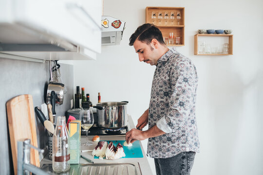 Man preparing food in kitchen