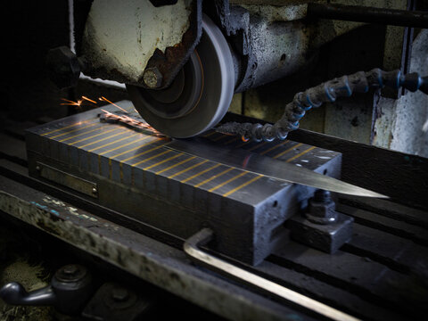 Knife on factory machinery in workshop