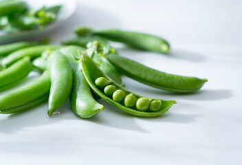 Snap peas on a white background