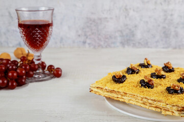 Dessert for Passover matzo cake with prunes and walnuts.