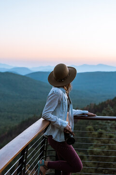  Woman enjoying sunset, Payson, Mogollon Rim, Arizona, United States