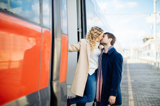 Couple kissing beside train, Firenze, Toscana, Italy