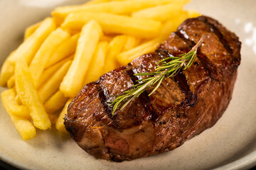 Grilled steak with french fries.