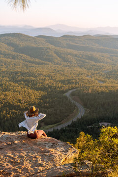  Woman enjoying sunset, Payson, Mogollon Rim, Arizona, United States