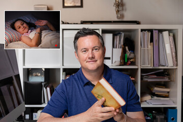 Man reading bedtime story for his daughter online during Coronavirus lockdown.