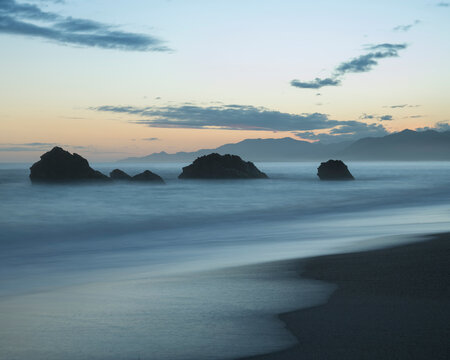 Playa Los Angeles At Dawn, Beach And View Out To The Ocean And Islands Offshore