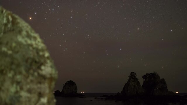 The Milky Way Showing up from behind the Rock (timelapse/dolly shot)