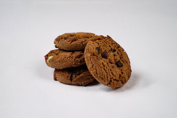 Delicious pastries with a unique variety of colorful choco chips have been a choice to enhance intimacy for a long time, with a yellow background that represents a cheerful atmosphere. Snack mockup.
