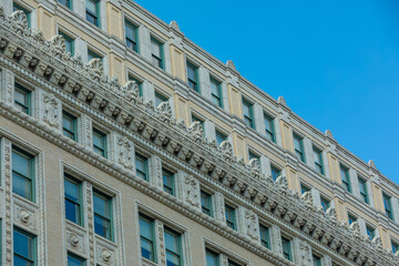 Fototapeta na wymiar Washington, DC, USA - 29 June 2020: Beautifully decorated Facade of a historic Apartment Building