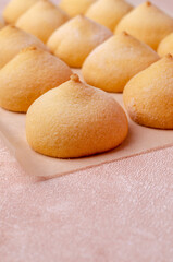 Sponge cookies on a cement background.