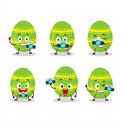 Photographer profession emoticon with light green easter egg cartoon character