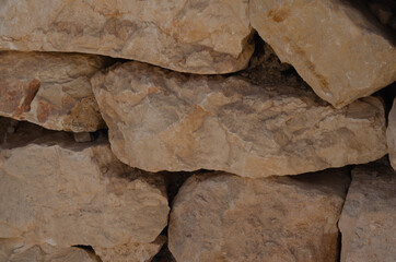 surface structure of brown shades of natural stone outdoors in nature