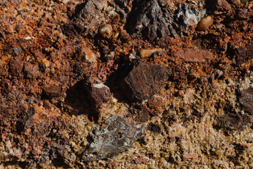 surface structure of brown shades of natural stone outdoors in nature