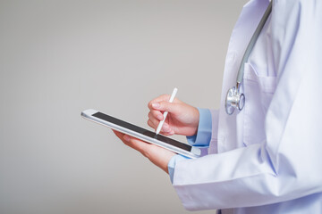 Medical doctor or physician consulting patient's health online using digital tablet, Online medical health or medical network concept.