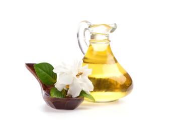 Gardenia jasminoides flower and oil isolated on white background.