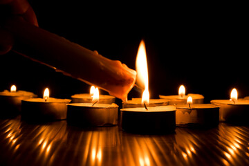 candles that are lit in the dark