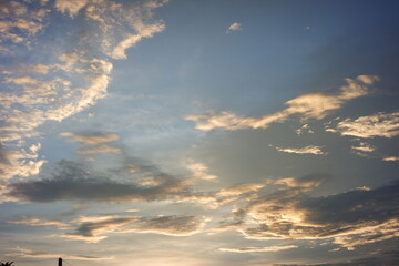 clear blue sky in the afternoon. bright red clouds at sunset